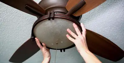 Ceiling fan repair and reinstallation on ceiling mount in Baton Rouge, LA