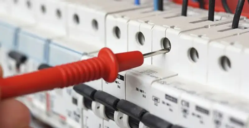 Electrical contractor testing circuit breakers during electrical repair in Addis, LA