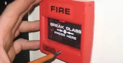 fire alarm installation service showing manual fire alarm pull station installed by licensed electricians in Baton Rouge, LA