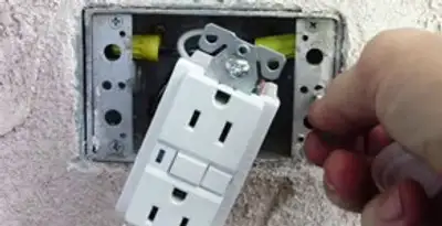gfci circuits service showing installation of a ground fault circuit interrupter outlet by licensed electricians in Baton Rouge, LA