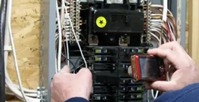 Home electrical inspection of circuit breaker panel by licensed electrician in Baton Rouge, LA