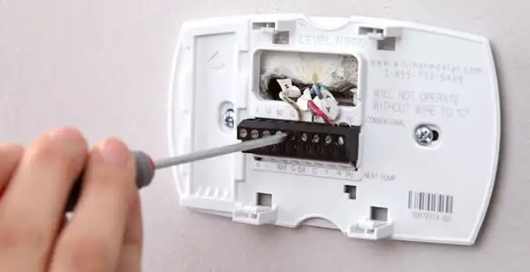 Thermostat installation service with proper wiring and secure wall mounting in Baton Rouge, LA